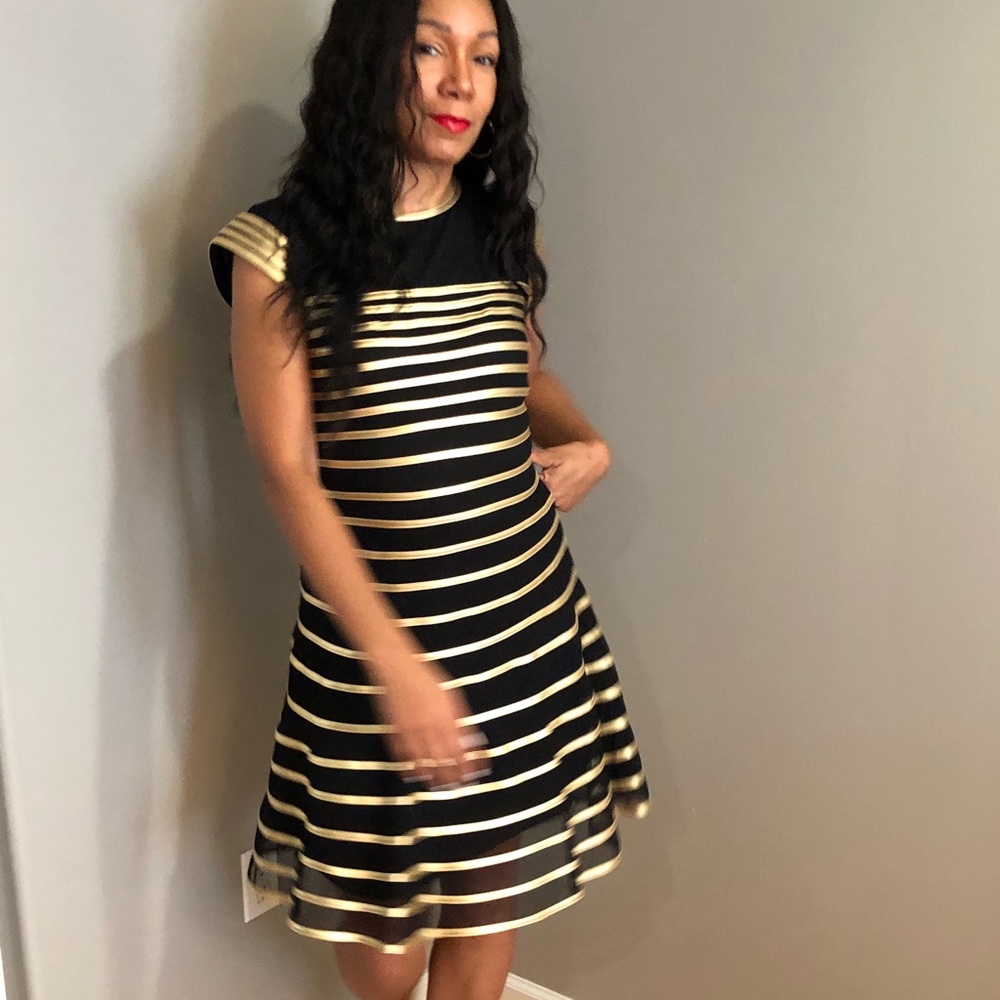 Black and gold cocktail dress.